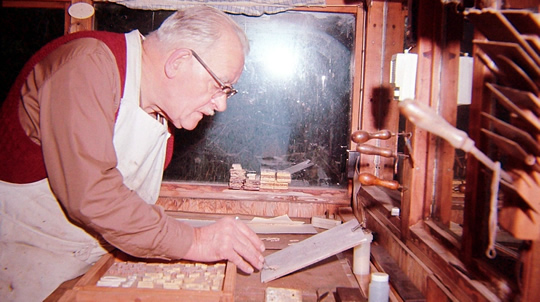 Andrew Oliver laying out marquetry components